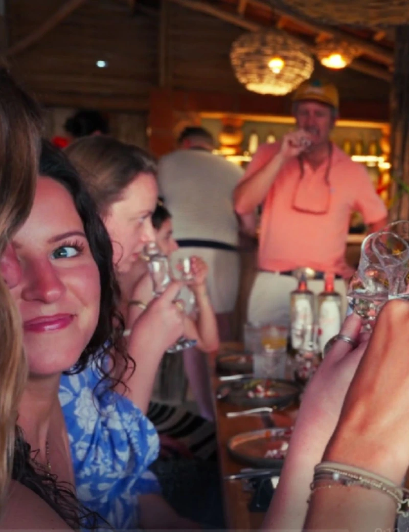 Friends toasting at a tequila tasting experience, Cachasol Farm Distillery Sayulita